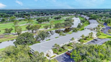 Rare First-Floor 3-Bedroom Corner Condo with Golf Course Views - on University Park Country Club in Florida - for sale on GolfHomes.com, golf home, golf lot