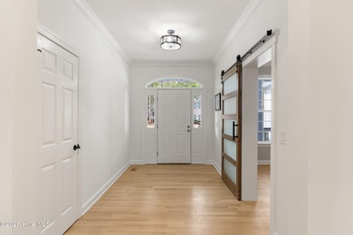 Prepared to be wowed by this custom William Poole designed home on Members Club At St. James Plantation in North Carolina - for sale on GolfHomes.com, golf home, golf lot