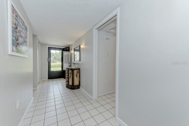 Rare First-Floor 3-Bedroom Corner Condo with Golf Course Views - on University Park Country Club in Florida - for sale on GolfHomes.com, golf home, golf lot