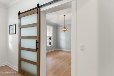 Prepared to be wowed by this custom William Poole designed home on Members Club At St. James Plantation in North Carolina - for sale on GolfHomes.com, golf home, golf lot