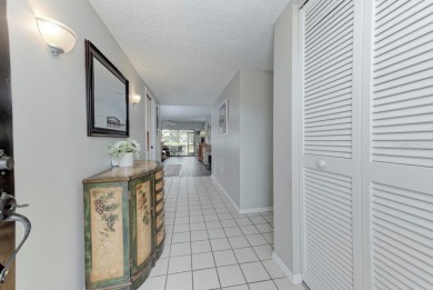 Rare First-Floor 3-Bedroom Corner Condo with Golf Course Views - on University Park Country Club in Florida - for sale on GolfHomes.com, golf home, golf lot