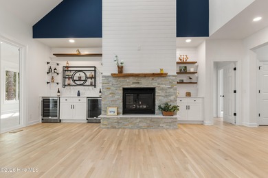 Prepared to be wowed by this custom William Poole designed home on Members Club At St. James Plantation in North Carolina - for sale on GolfHomes.com, golf home, golf lot