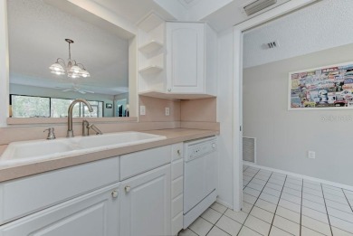 Rare First-Floor 3-Bedroom Corner Condo with Golf Course Views - on University Park Country Club in Florida - for sale on GolfHomes.com, golf home, golf lot