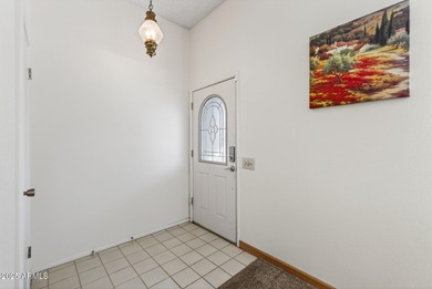 Wonderful 2-bed, 1-bath home with an enclosed Arizona room for on Sun City Riverview Golf Course in Arizona - for sale on GolfHomes.com, golf home, golf lot