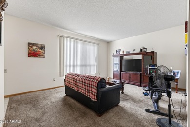 Wonderful 2-bed, 1-bath home with an enclosed Arizona room for on Sun City Riverview Golf Course in Arizona - for sale on GolfHomes.com, golf home, golf lot