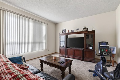 Wonderful 2-bed, 1-bath home with an enclosed Arizona room for on Sun City Riverview Golf Course in Arizona - for sale on GolfHomes.com, golf home, golf lot