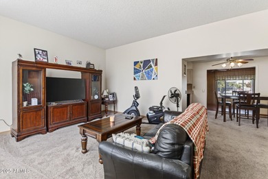 Wonderful 2-bed, 1-bath home with an enclosed Arizona room for on Sun City Riverview Golf Course in Arizona - for sale on GolfHomes.com, golf home, golf lot