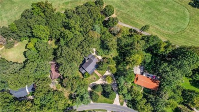 Welcome home to this luxurious spacious gem in the beautiful on Forest Oaks Country Club in North Carolina - for sale on GolfHomes.com, golf home, golf lot