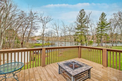 Charming lakefront living awaits in this spacious 2-bedroom on Lake Tansi Village Country Club in Tennessee - for sale on GolfHomes.com, golf home, golf lot
