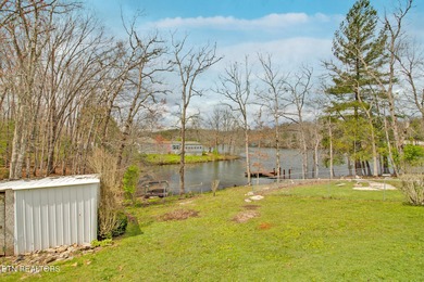 Charming lakefront living awaits in this spacious 2-bedroom on Lake Tansi Village Country Club in Tennessee - for sale on GolfHomes.com, golf home, golf lot