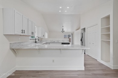 Nestled in the sought-after Sunridge community, this beautifully on Sun Ridge Golf Course in Nevada - for sale on GolfHomes.com, golf home, golf lot