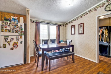 Charming lakefront living awaits in this spacious 2-bedroom on Lake Tansi Village Country Club in Tennessee - for sale on GolfHomes.com, golf home, golf lot