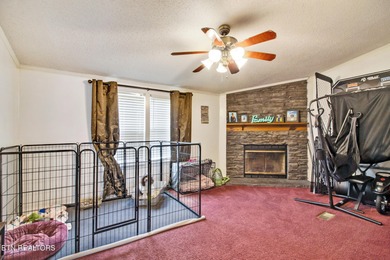 Charming lakefront living awaits in this spacious 2-bedroom on Lake Tansi Village Country Club in Tennessee - for sale on GolfHomes.com, golf home, golf lot