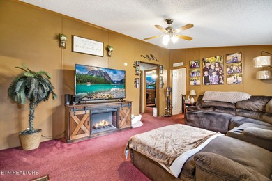 Charming lakefront living awaits in this spacious 2-bedroom on Lake Tansi Village Country Club in Tennessee - for sale on GolfHomes.com, golf home, golf lot