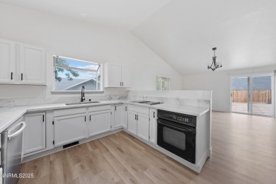 Nestled in the sought-after Sunridge community, this beautifully on Sun Ridge Golf Course in Nevada - for sale on GolfHomes.com, golf home, golf lot