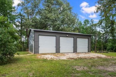**Secluded Haven for the Avid Angler!** Nestled in Rayburn on Rayburn Country Club in Texas - for sale on GolfHomes.com, golf home, golf lot