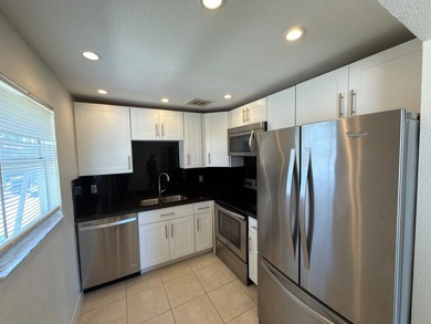 This updated unit features granite countertops, stainless on Kings Point Golf -Flanders Way in Florida - for sale on GolfHomes.com, golf home, golf lot