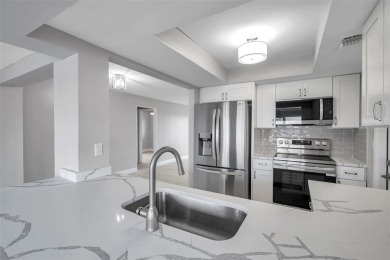 Beautifully renovated home in the golf course community of on Mainlands Golf Club in Florida - for sale on GolfHomes.com, golf home, golf lot