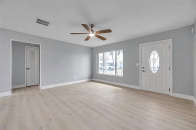 Beautifully renovated home in the golf course community of on Mainlands Golf Club in Florida - for sale on GolfHomes.com, golf home, golf lot