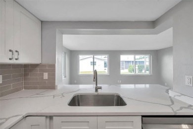 Beautifully renovated home in the golf course community of on Mainlands Golf Club in Florida - for sale on GolfHomes.com, golf home, golf lot