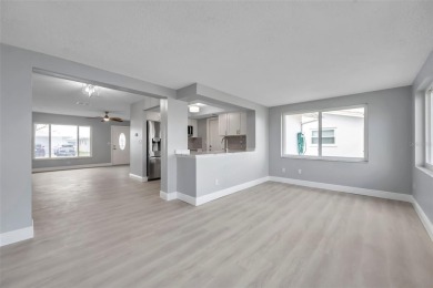 Beautifully renovated home in the golf course community of on Mainlands Golf Club in Florida - for sale on GolfHomes.com, golf home, golf lot