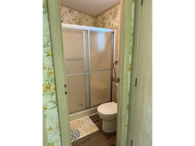 This lovely, 2/2 manufactured home is on leased land. Located in on Pine Lakes Country Club in Florida - for sale on GolfHomes.com, golf home, golf lot