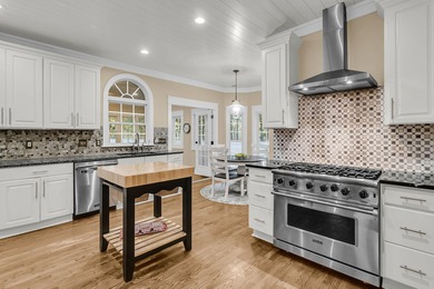 Situated on over an acre along the fourth hole of the Dunes West on Dunes West Golf Club in South Carolina - for sale on GolfHomes.com, golf home, golf lot