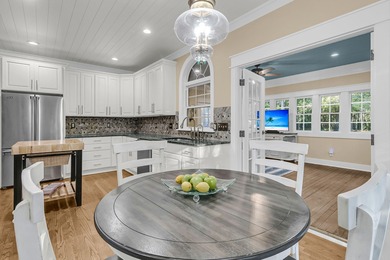 Situated on over an acre along the fourth hole of the Dunes West on Dunes West Golf Club in South Carolina - for sale on GolfHomes.com, golf home, golf lot