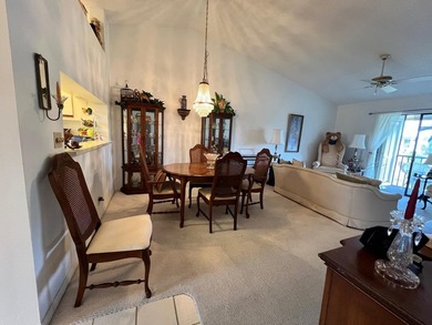 LOCATION IS THE KEY! NESTLED IN A VIBRANT 55+ COMMUNITY, THIS on Forest Oaks Golf Club in Florida - for sale on GolfHomes.com, golf home, golf lot