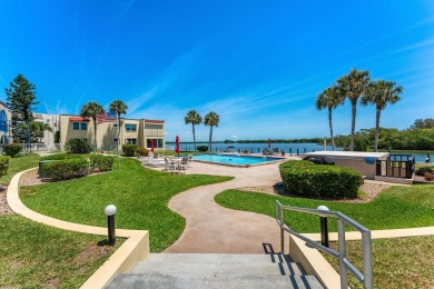 Experience the Magic of Waterfront Living at Spanish Trace on Cocoa Beach Country Club in Florida - for sale on GolfHomes.com, golf home, golf lot