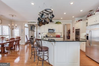 Tucked away on 1.5 acres in a quiet cul-de-sac of the on The Providence Club in Georgia - for sale on GolfHomes.com, golf home, golf lot