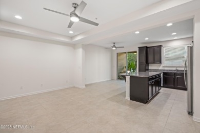 This charming Segovia townhome offers an inviting open floor on Slammer and Squire Golf Course in Florida - for sale on GolfHomes.com, golf home, golf lot