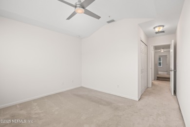 This charming Segovia townhome offers an inviting open floor on Slammer and Squire Golf Course in Florida - for sale on GolfHomes.com, golf home, golf lot