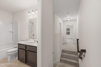 This charming Segovia townhome offers an inviting open floor on Slammer and Squire Golf Course in Florida - for sale on GolfHomes.com, golf home, golf lot