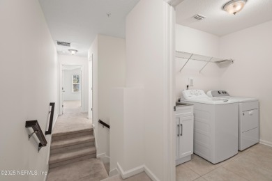 This charming Segovia townhome offers an inviting open floor on Slammer and Squire Golf Course in Florida - for sale on GolfHomes.com, golf home, golf lot