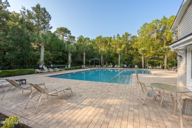 This charming Segovia townhome offers an inviting open floor on Slammer and Squire Golf Course in Florida - for sale on GolfHomes.com, golf home, golf lot