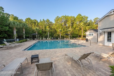 This charming Segovia townhome offers an inviting open floor on Slammer and Squire Golf Course in Florida - for sale on GolfHomes.com, golf home, golf lot