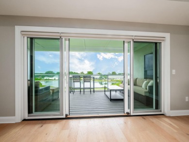 Immaculate and better than new, this 2nd-floor end-unit condo in on Little Turtle Golf Club in Ohio - for sale on GolfHomes.com, golf home, golf lot