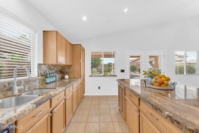 This beautifully maintained home features a sparkling salt water on The Golf Club At Johnson Ranch in Arizona - for sale on GolfHomes.com, golf home, golf lot