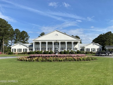 Build the custom home of your dreams on this lovely homesite in on Brunswick Plantation and Golf Resorts in North Carolina - for sale on GolfHomes.com, golf home, golf lot