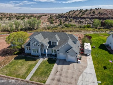 Gorgeous custom 6 bedroom 4.5 bathroom home in Frontier Estates on Snowflake Municipal Golf Course in Arizona - for sale on GolfHomes.com, golf home, golf lot
