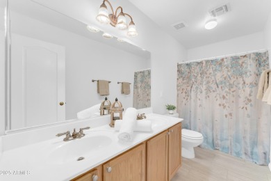 This beautifully maintained home features a sparkling salt water on The Golf Club At Johnson Ranch in Arizona - for sale on GolfHomes.com, golf home, golf lot