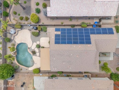 This beautifully maintained home features a sparkling salt water on The Golf Club At Johnson Ranch in Arizona - for sale on GolfHomes.com, golf home, golf lot