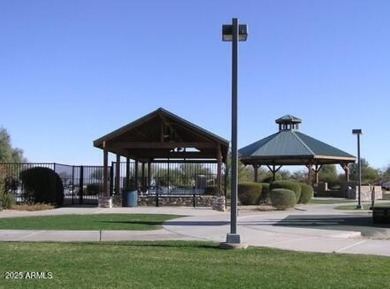 This beautifully maintained home features a sparkling salt water on The Golf Club At Johnson Ranch in Arizona - for sale on GolfHomes.com, golf home, golf lot