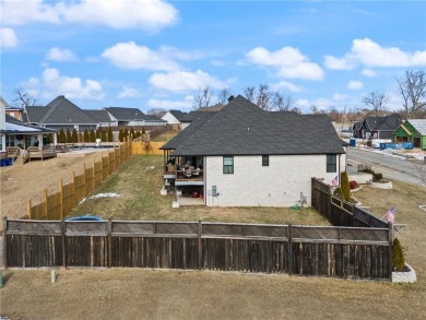 Welcome Home to this Sugar Creek Stunner! Four bedrooms with a on Big Sugar Golf Club in Arkansas - for sale on GolfHomes.com, golf home, golf lot