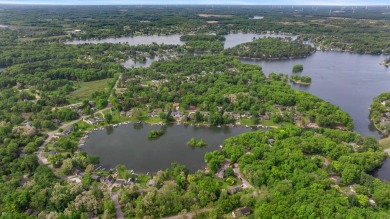 Welcome to 11815 Waldron Rd, a truly remarkable Prow Design home on Lake LeAnn Golf Course in Michigan - for sale on GolfHomes.com, golf home, golf lot