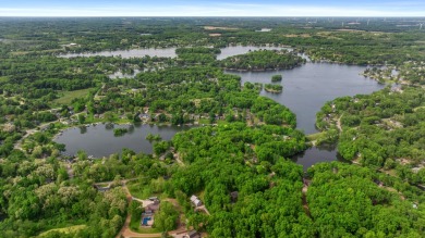 Welcome to 11815 Waldron Rd, a truly remarkable Prow Design home on Lake LeAnn Golf Course in Michigan - for sale on GolfHomes.com, golf home, golf lot