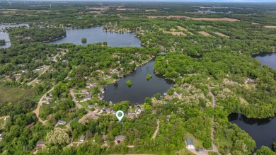Welcome to 11815 Waldron Rd, a truly remarkable Prow Design home on Lake LeAnn Golf Course in Michigan - for sale on GolfHomes.com, golf home, golf lot