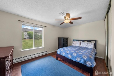 Public: Discover easy one-level living in this charming end unit on Clearbrook Golf Club in New Jersey - for sale on GolfHomes.com, golf home, golf lot