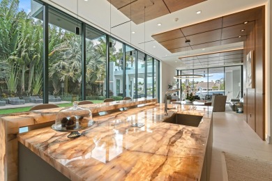 In a league of its own, this architectural masterpiece in on The Club At Admirals Cove Golf Village in Florida - for sale on GolfHomes.com, golf home, golf lot